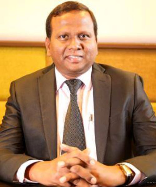 Dr S Thomas George